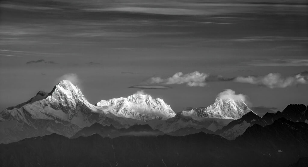 A black and white image of the Annapurna Range, as seen from Laurebina Mountain Pass in Nepal