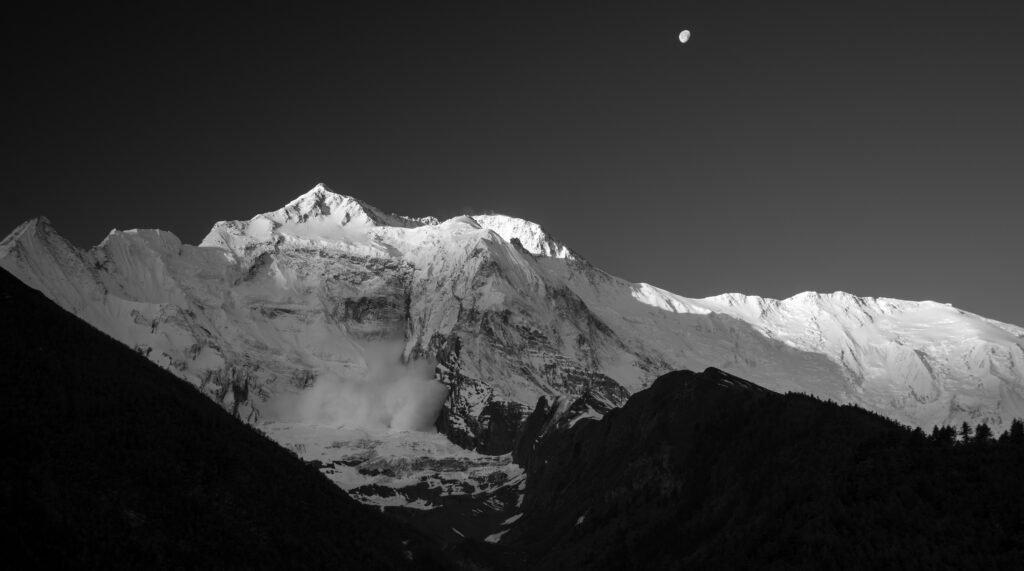 An avalanche on the Annapurna Range, black and white