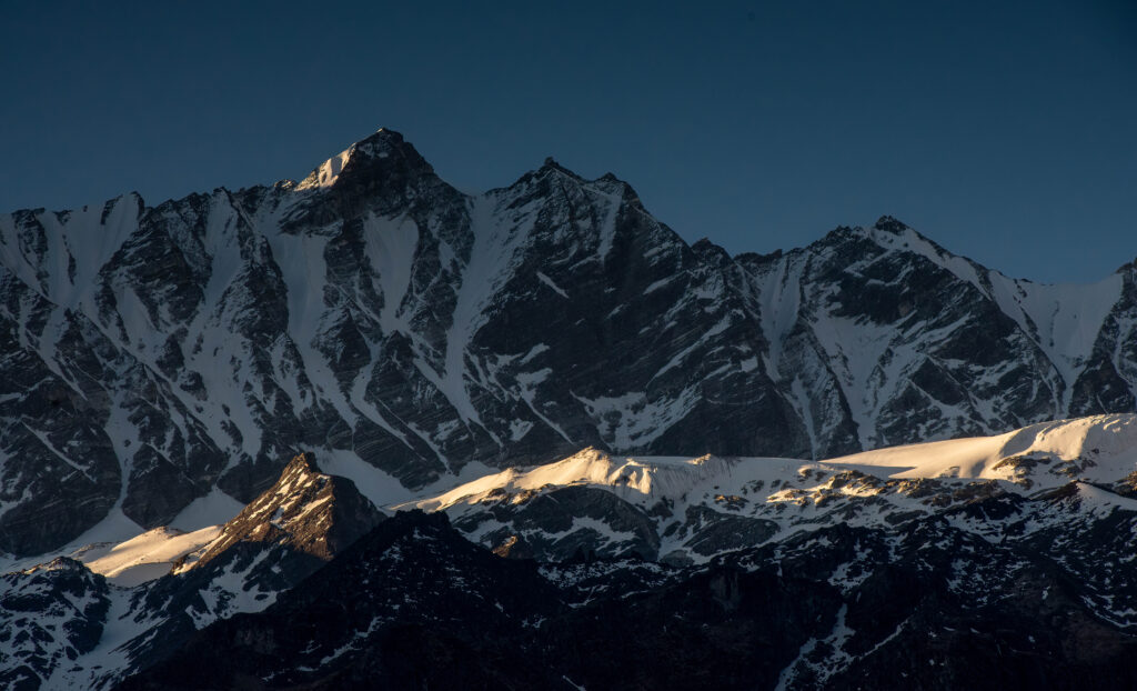 Dawn beginning to illuminate the Himalayan peaks