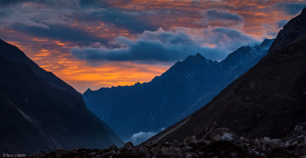 An orange sunset seen from Langtang Valley