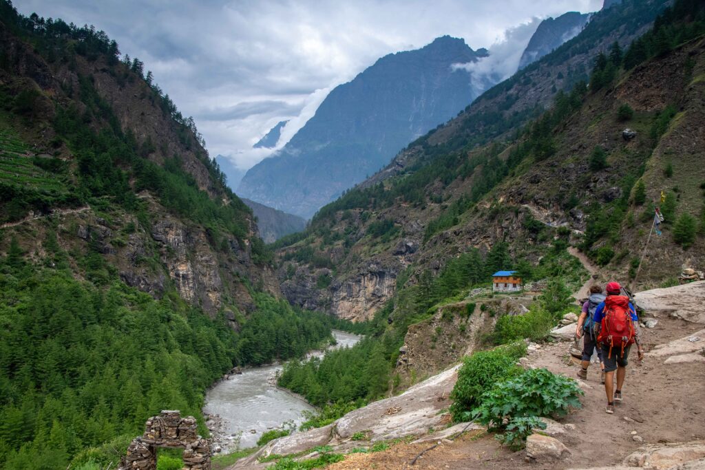 A winding path leading trekkers through the valley