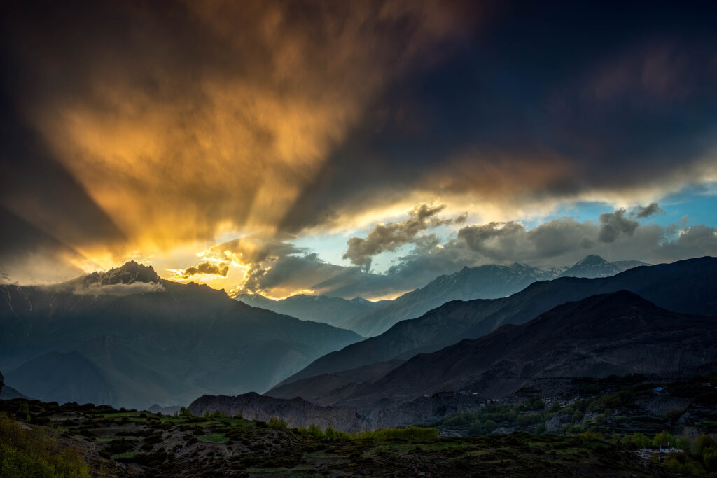 Sunlight streaming from the clouds near Muktinath, Annapurna Circuit