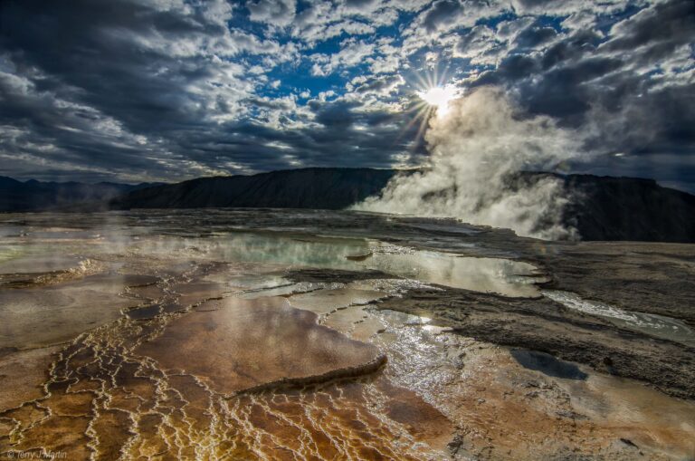 The clouds reflecting off Mammoth Hot Springs in Yellowstone National Park